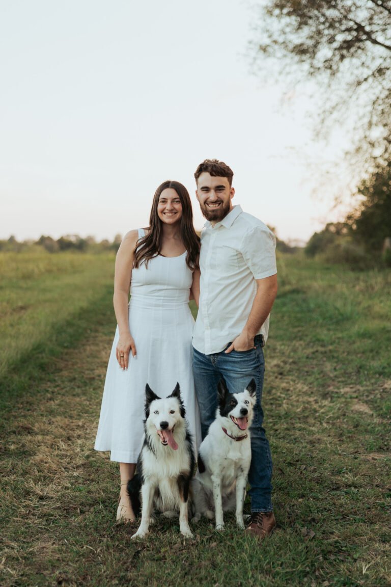 Caleb and Sophia with their dogs smiling